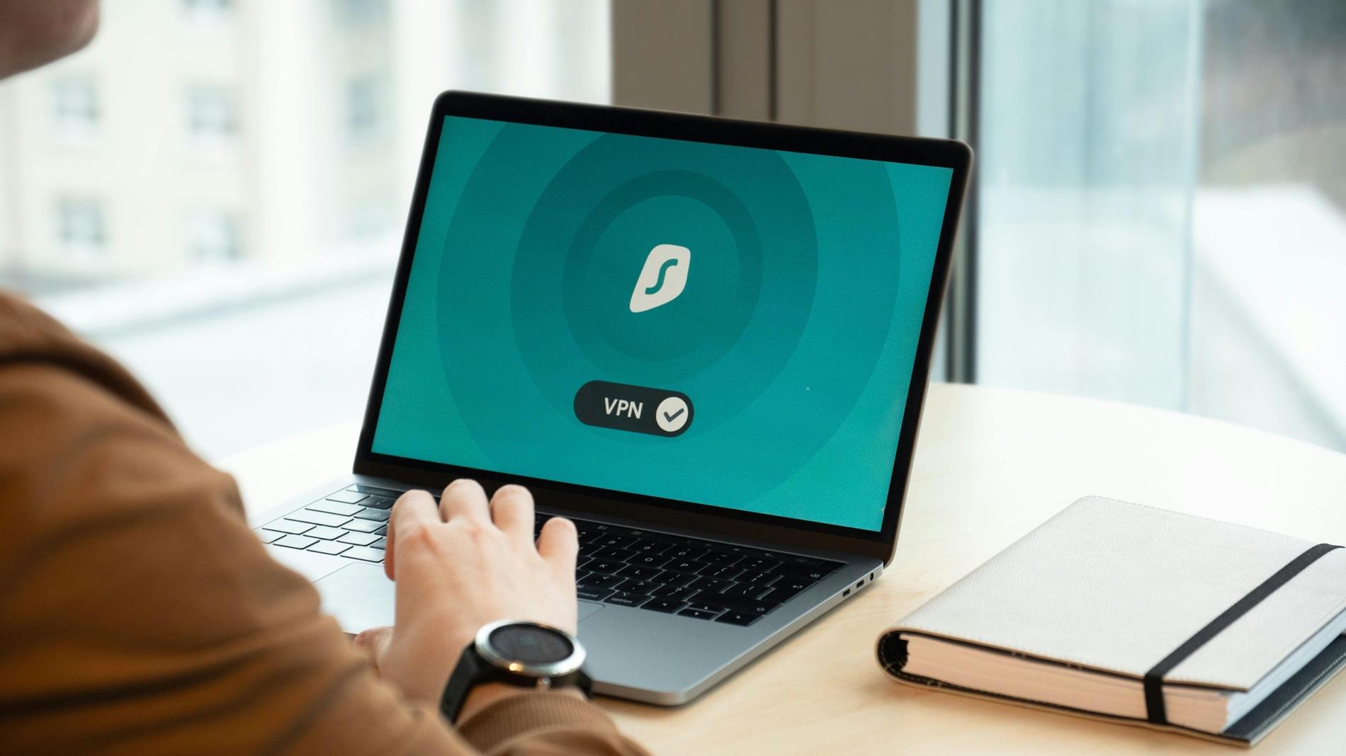 Person using VPN software on their laptop