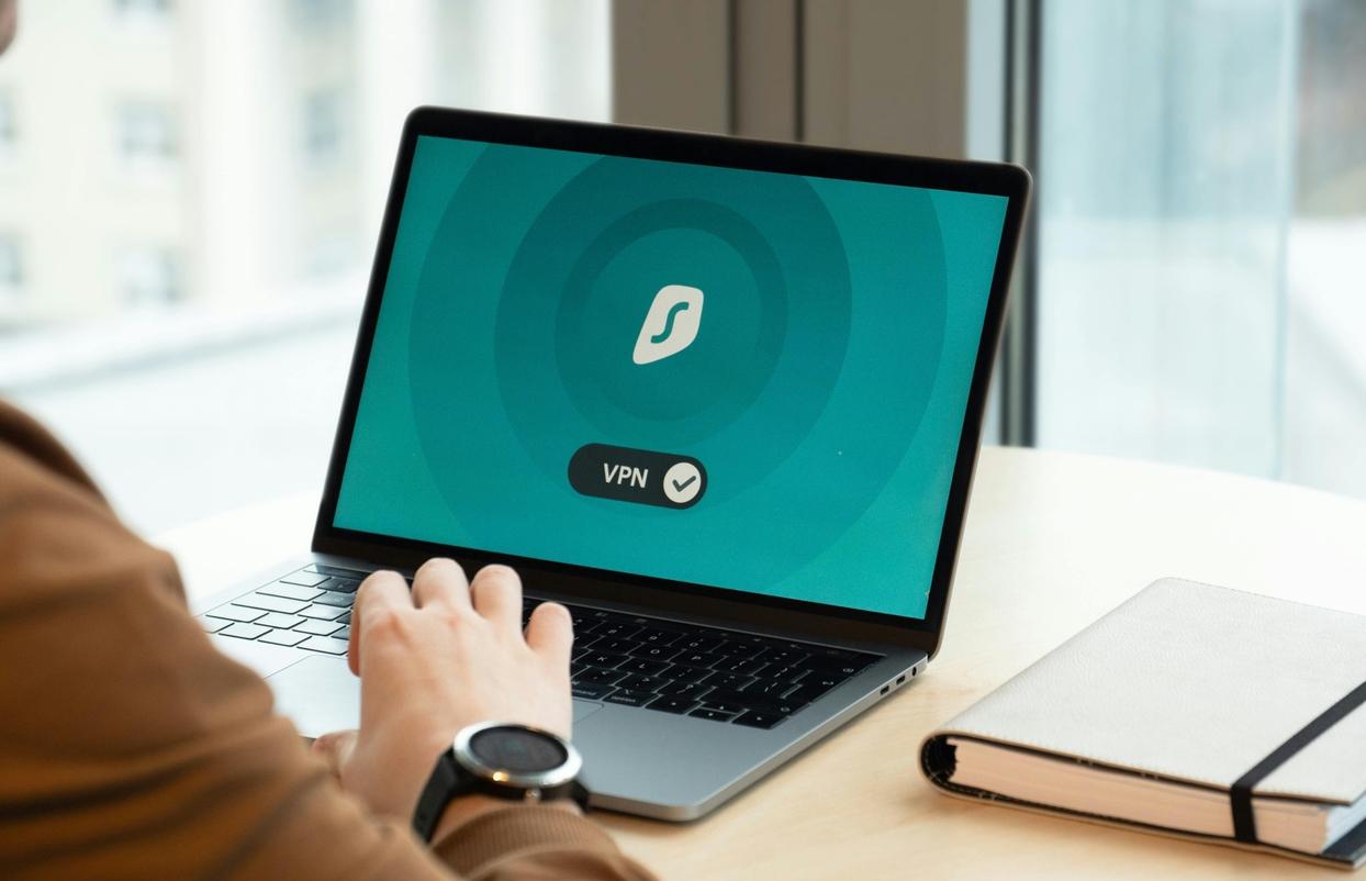 Person using VPN software on their laptop
